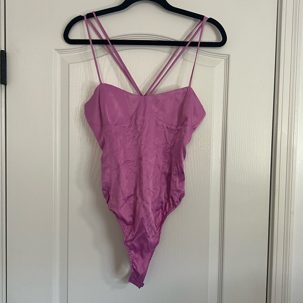 Silky, cross-cross back bodysuit